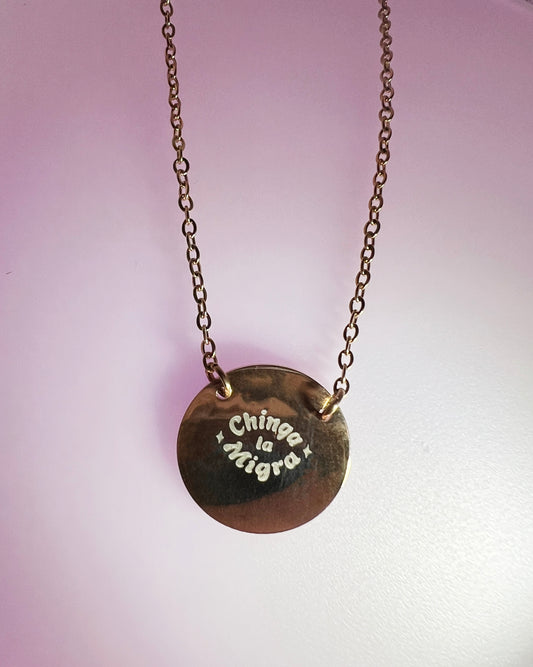 Chinga la Migra engraved necklace