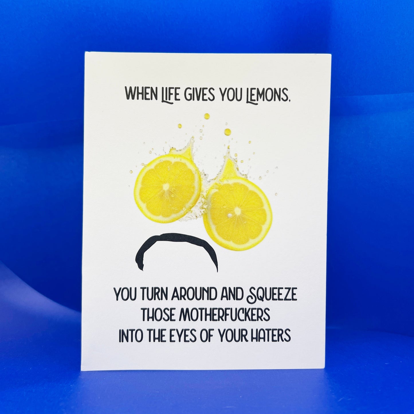 Card with lemon graphic and text on a blue background